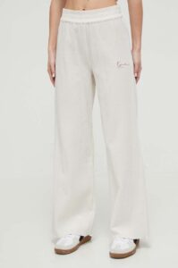 Bavlněné kalhoty Karl Kani béžová barva