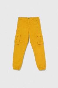 Dětské bavlněné kalhoty Guess žlutá