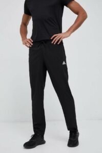 Tréninkové kalhoty adidas Essentials Stanford černá