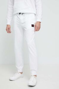 Bavlněné kalhoty HUGO bílá barva